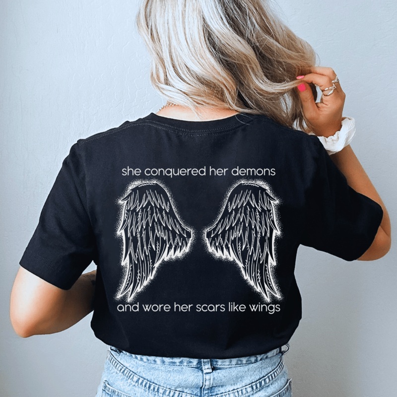 She Conquered Her Demons And Wore Her Scars Like Wings Tee Black S