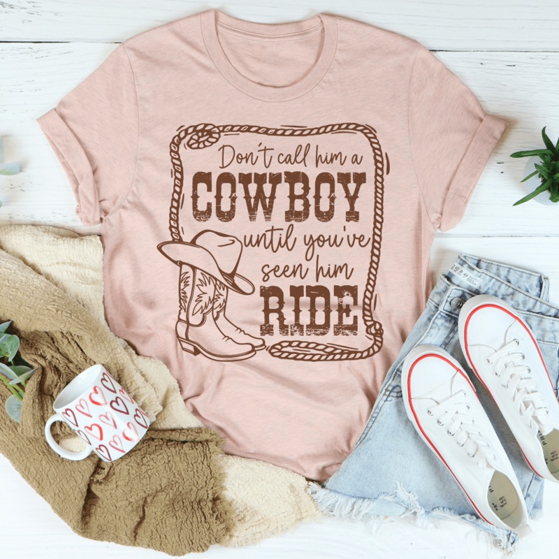 Don’t Call Him A Cowboy Until You’ve Seen Him Ride Tee Heather Prism Peach S