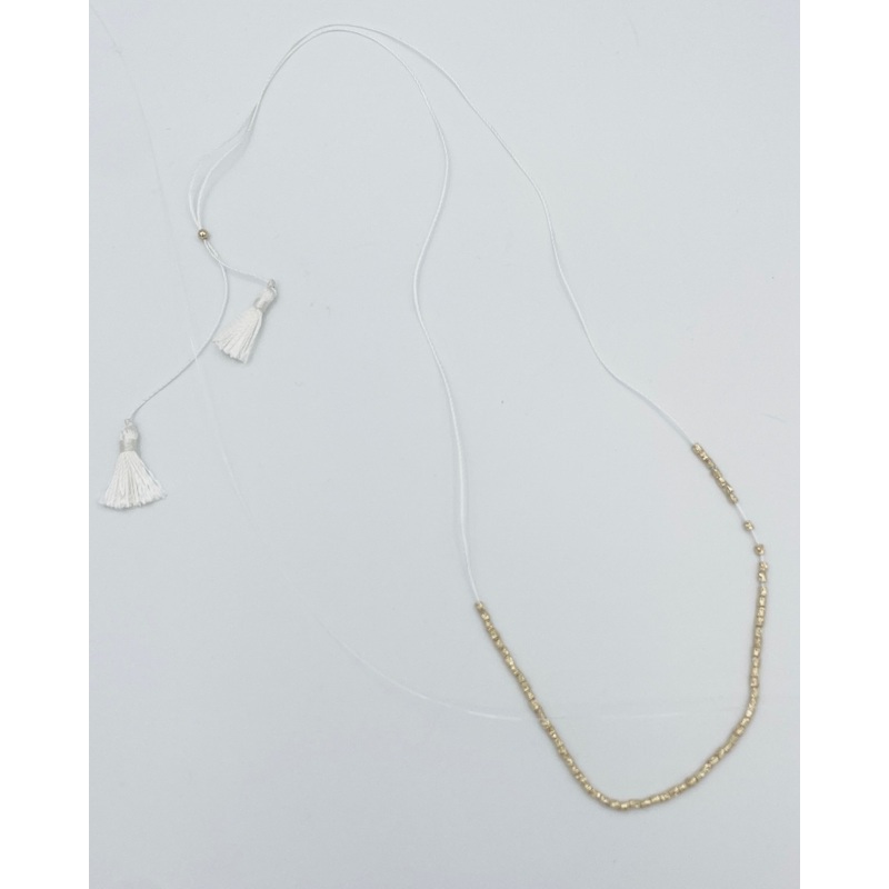 White String Necklace With Gold Beads