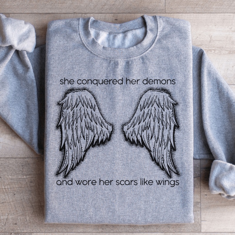 She Conquered Her Demons And Wore Her Scars Like Wings Sweatshirt Black S
