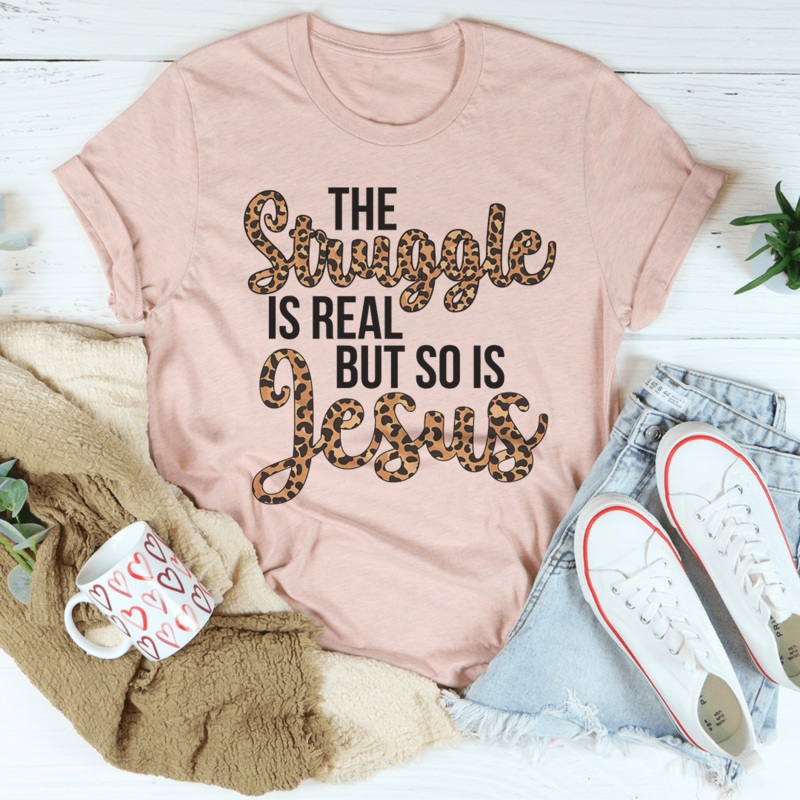 The Struggle Is Real But So Is Jesus Tee Heather Prism Peach S