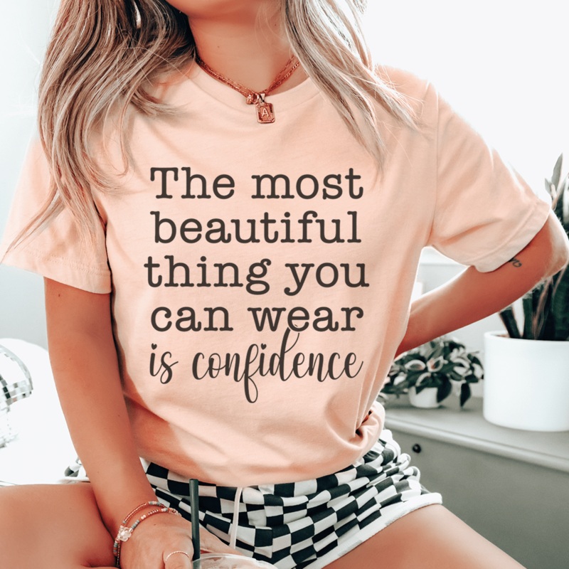 The Most Beautiful Thing You Can Wear Is Confidence Tee Heather Prism Peach S