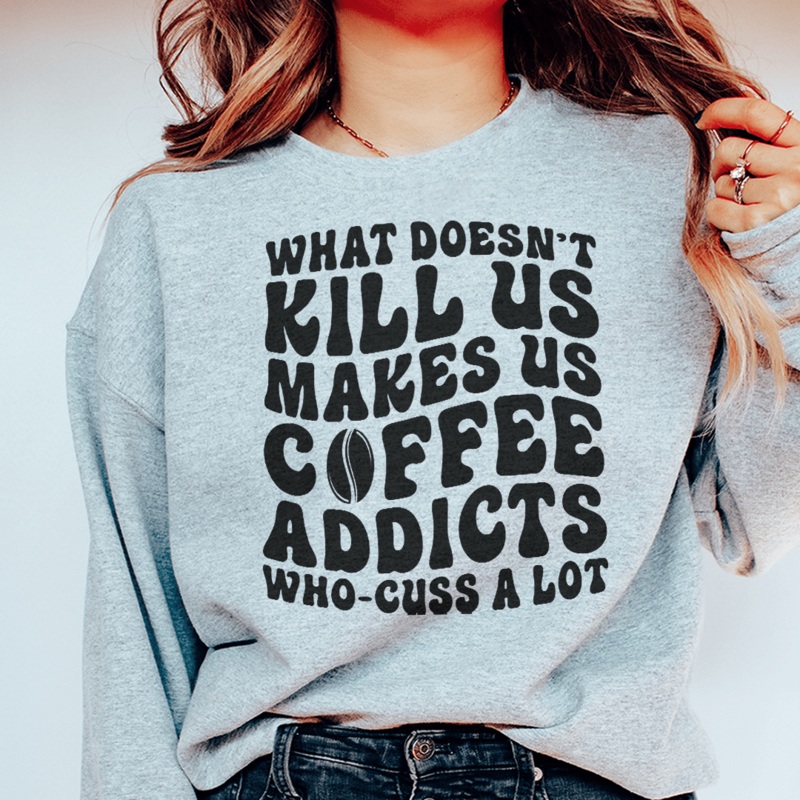 What Doesn’t Kill Us Makes Us Coffee Addicts Sweatshirt Black S